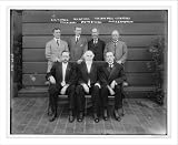 Newswire Photo (L): E.W.V. Kuehn, Gen. W.P. Hall, R.B. Maxwell, J.T.D. Pyles, Dr. J.W. Jones, Pastor Russell