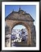 Entry to Jewish Quarter, Puerta de la Exijara, Ronda, Spain Places Framed Art Poster Print by John & Lisa Merrill, 39x49