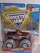 2011 HOT WHEELS CHRISTMAS HOLIDAY EDITION 1:64 SCALE EL TORO LOCO MONSTER JAM TRUCK WITH SNOW ON THE TIRES AND CHRISTMAS TREES ON THE CARD