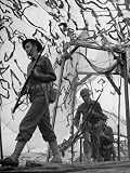 American Soldiers Drill under Camouflage Netting, Shortly After the Surprise Attack on Pearl Harbor Photographic Poster Print by Peter Stackpole, 30x40