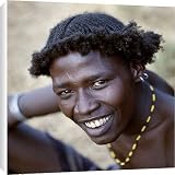 Canvas Prints of An unusual braided hairstyle of a Dassanech young man from AWL Discover Images