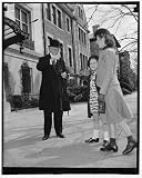 Photo Reprint Chief Justice celebrates 77th birthday. Washington, D.C., April 11. Leaving his home for the usual
