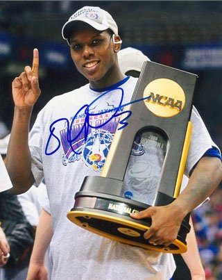 Russell Robinson Autographed/Hand Signed Holding Trophy Kansas Jayhawks 8x10 Photo