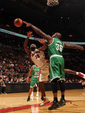 Boston Celtics v Toronto Raptors: Shaquille O'Neal and Reggie Evans Photographic Poster Print by Ron Turenne, 42x56