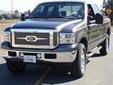 T-Rex | 54561 | 2005 - 2007 | Ford Super Duty, Excursion (Except Harley Edition Trucks) | Upper Class Mesh Grille - Polished Stainless Steel - Includes Custom Logo Plate