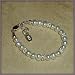 Victoria Sterling Silver Childrens Girls Bracelet Jewelry NEW! Luxurious sterling silver bracelet with beautiful soft white freshwater pearls accented with shimmering silver daisies. A keepsake she will cherish forever! Size Large 6-13 Years