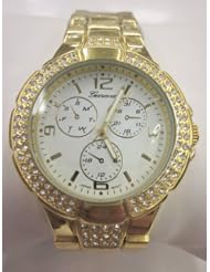 Geneva Yellow Gold Tone Classic Round Cz Ladies Boyfriend Watch. Faux Chronograph Design. Crystal Rhinestones Around Bezel and Crystal Clusters on Top and Bottom of Face. Metal Link Band. Handles Are Glow in the Dark. Secure Double Closure. Gift Box Included for Easy Gift Giving.