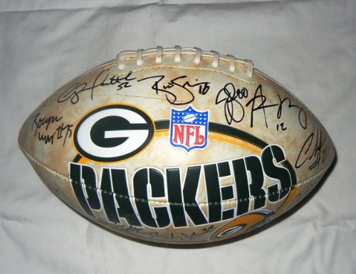 2010-11 Green Bay Packers Team Signed Logo Football W/PROOF, Picture of The Players Signing For Us, Super Bowl XLV Champions, Aaaron Rodgers, Charles Woodson, James Starks, Mike McCarthy, Donald Driver, Greg Jennings, Clay Matthews, And Many More
