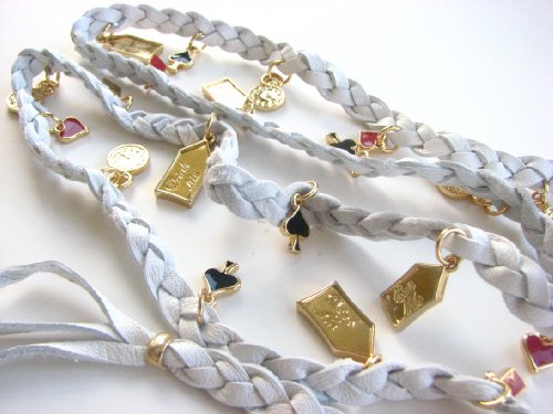 Click here to buy Disney Couture 14K Gold Plated Eat Me Drink Me MultiCharms Leather Wrap Bracelet White We Do NOT... by Disney Couture.
