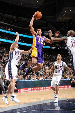 Los Angeles Lakers v New Jersey Nets: Shannon Brown, Jordan Farmar and Quinton Ross Photographic Poster Print by Andrew Bernstein, 28x42