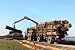 Forestry Workers in the Loading of Logs - 48W x 32H - Peel and Stick Wall Decal by Wallmonkeys