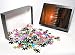 Photo Jigsaw Puzzle of The setting sun viewed through a fence on a sandy beach from ClownFish Photo