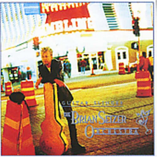 The Brian Setzer Orchestra - The Man With The Magic Touch Lyrics - Zortam Music