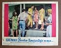 CX25 Paradise-Hawaiian Style ELVIS PRESLEY  Lobby Card.  Here&rsquo;s a terrific lobby card from the original release of PARADISE-HAWAIIAN STYLE featuring a great image of ELVIS PRESLEY.    Lobby card is in VERY GOOD+ condition. Some pinholes, no stains, no tears. Some smudging on the borders.       A lobby card is an 11 x 14 inch placard advertising a movie. They were displayed in the theatre lobby to entice moviegoers to go to the box office and buy a ticket.