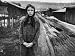 Daughter of Jobless Miner Standing in Alley Between Rows of 