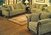 2 pc Sofa and love seat set green chenille fabric with cherry wood accents.