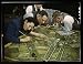 Photo Camouflage class in New York University, where men and women are preparing for jobs in the Army or in industry,