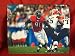 Tommie Harris Autographed Chicago Bears 8x10 Photo, Proof Photo of Tommie Signing for Us.