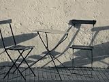 Table And Chairs at a Sidewalk Cafe, Colonia Del Sacramento, Uruguay Photographic Poster Print, 12x16