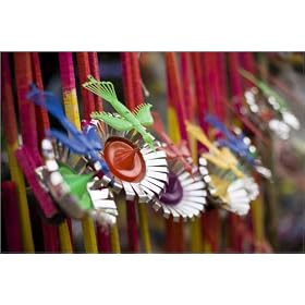 photographie Close up detail of wind propelled toys for sale during the Chitmorong Buddhist Water...