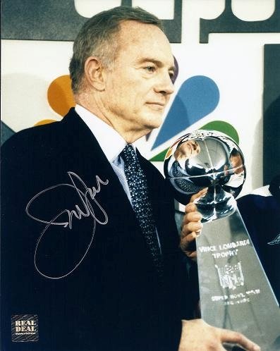 Jerry Jones Autographed/Hand Signed Dallas Cowboys 8x10 Photo with Super Bowl Trophy