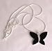 Fashion pendant or necklace with black and diamante butterfly design