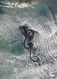 Cloud Vortices off Cheju Do, South Korea. - 36"H x 26"W - Peel and Stick Wall Decal by Wallmonkeys