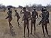 Bushmen or San Hunter-Gatherers Pause to Check a Distant Wild Animal in the Early Morning, Namibia Photographic Poster Print by Nigel Pavitt, 24x32