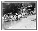 Historic Print (L): On one of the hottest days recorded in the National Capital both women and children rush