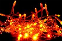 Sunset LED fairy lights in red, orange and yellow, made by QB