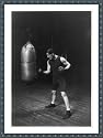Historic Print (S): Corbett punching the bag to get in condition to handle Jeffries for the championship fig