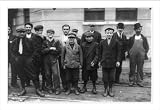 Historic Print (L): Dennis Cavanaugh, 24 Bassett St., works in spinning room No. 6. Door boy is Alexander St