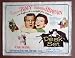 Search : ORIGINAL LOBBY CARD: DA12 HERE COME THE CO-EDS great Abbott/Costello '45 LC.  Heres a terrific lobby card from the original release of HERE COME THE CO-EDS featuring a great image of BUD ABBOTT and LOU COSTELLO. A must for ABBOTT AND COSTELLO collectors.    Lobby card is in EXCELLENT-condition. No pinholes, , a faint water mark on the right edge, a one-half inch edge tear on the upper border.       A lobby card is an 11 x 14 inch placard advertising a movie. They were displayed in the theatre lobby to entice moviegoers to go to the box office and buy a ticket.