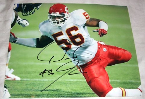 Derrick Johnson Autographed Kansas City Chiefs 8x10 Photo W/PROOF, Picture of Derrick Signing For, Kansas City Chiefs, Texas Longhorns