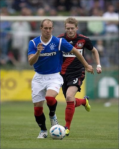 Photographic Prints of Soccer - Rangers v Bayer 04 Leverkusen - Pre Season Friendly - Takko Stadium from Rangers
