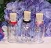 Pink/red/black Charmed Potion Bottles.