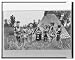 Historic Print (L): [Group of Siksika (Blackfeet) men and one woman singing in front ...