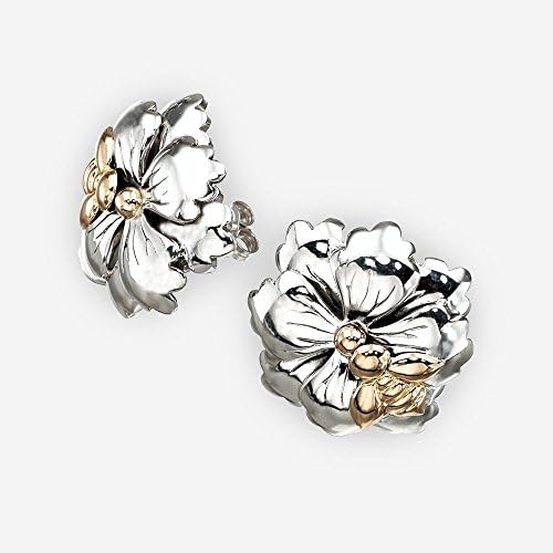 Big flower shaped studs in sterling silver and a gold bee detail in 14K yellow gold, ethnic motives and mystic symbols.