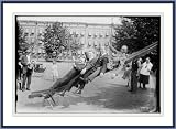 Photo (L): 4 men on slide in park