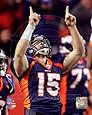 Tim Tebow - 2011 Denver Broncos NFL 8x10 Photo (pointing upwards)