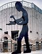 Seattle's 'Hammering Man' Photograph - Beautiful 16x20-inch Photographic Print by Carol M. Highsmith