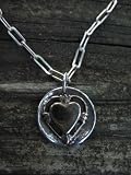 Childrens Girls or Boys Relic Deco Heart Charm, Relic Deco Heart Charm is Sterling Silver and Solid Brass. The Charm measures 3/4. 16 Sterling Chain