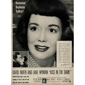 1949 Movie Ad, "KISS IN THE DARK", starring David Niven and Jane Wyman, with Victor Moore, Wayne Morris, and Broderick Crawford. Directed by Delmer Daves. Produced by Harry Kurnitz. Screenplay by Harry Kurnitz. From a story by Everett and Devery Freeman. Original music composed and adapted by Max Steiner. A0574. **THIS IS AN AD / POSTER, NOT A DVD**
