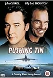 Pushing Tin