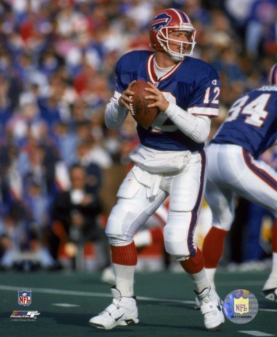 Jim Kelly Buffalo Bills 8x10 Photo (Blue Jersey, Looking To Pass)