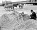 Photographic Prints of ATLANTIC CITY THE SANDMAN. A man making sculptures and messages in the sand on from Granger Art on Demand