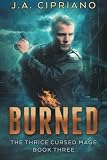 Burned (The Thrice Cursed Mage) (Volume 3)