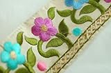 Indian Embroidered Sari Ribbon Trimming or Shalwar Kameeze Border; A Original design only available to Neotrims as part of its Special Embellished Trimmings collection for Dressmaking or Interior Decoration. This one is 6cms deep in 3 colour options. Sold by meter or by a complete Saree Border length of 9 meters