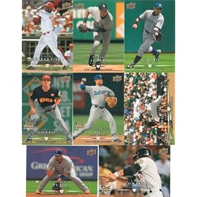 2008 Upper Deck "First Edition" Baseball Series 300 Card Complete Mint Set. Loaded with Stars Including Albert Pujols, Ken Griffey, Frank Thomas, Mike Piazza, Derek Jeter, Greg Maddux, Ichiro Suzuki, Chipper Jones and Many Others! There Are 50 Rookie Cards with the New "Rookie Card" Logo on Them Including J.R. Towles, Joey Votto, Daric Barton, Clay Buchholz and Many More! Usual Sharp Photography, Great Looking Cards!!