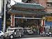 Photo Jigsaw 16x12 (40x30cm) Jeepney driving under Chinatown Gate by Robert Harding